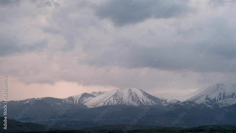 Video of the movement of clouds over the snowy mountain Video of the movement of clouds over the snowy mountain