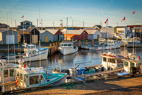 Docked fishing boats in North Lake Harbor at dawn on Prince Edward Island Canada