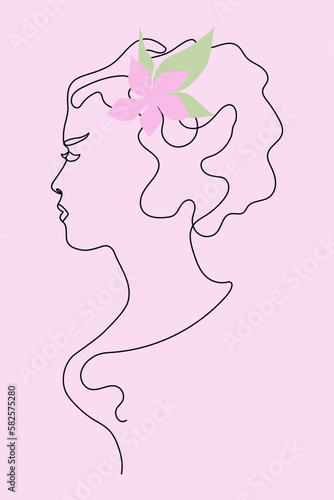 Drawing of a woman with a flower in profile in One line style. © Katerina