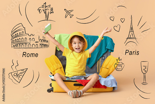 Little boy with passport an...
