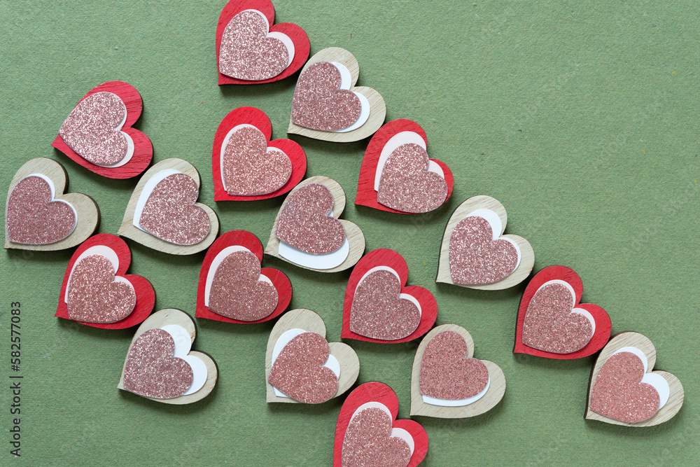 Naklejka premium paper hearts on wood hearts