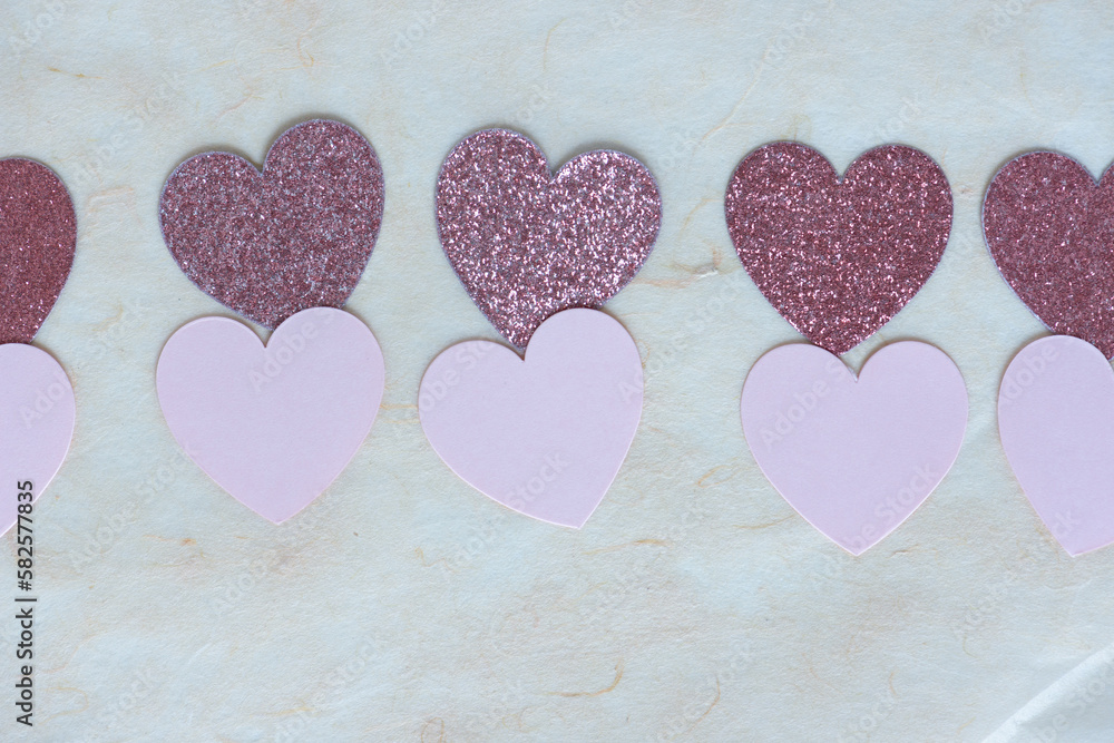 glitter and plain hearts on tissue paper glitter and plain hearts on tissue paper