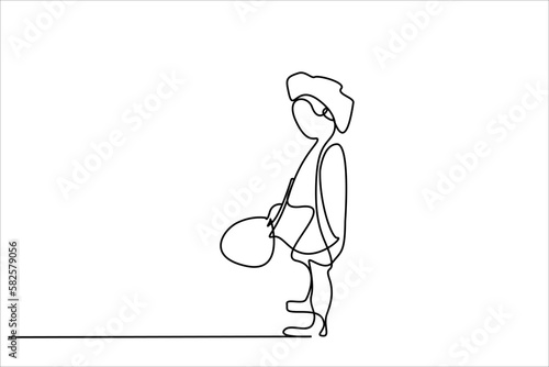 young little girl holding balloon she is upset crying standing waiting