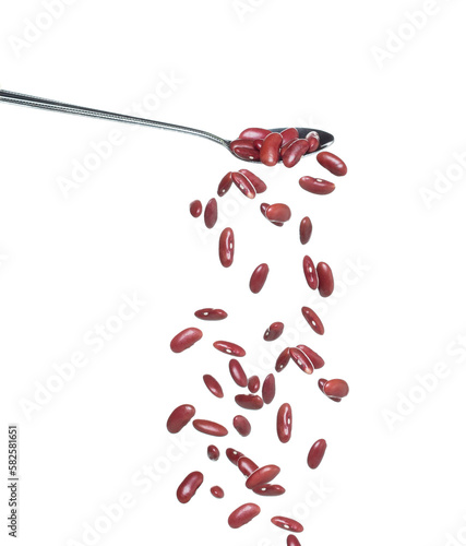 Red Bean fall, red grain beans explode abstract cloud fly from silver spoon. Beautiful complete seed pea bean, food object design. Selective focus freeze shot white background isolated photo