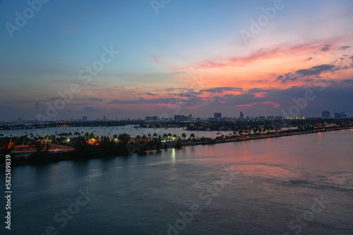 landscape of Miami port before sunrise, tropical seacoast under twilight © nd700