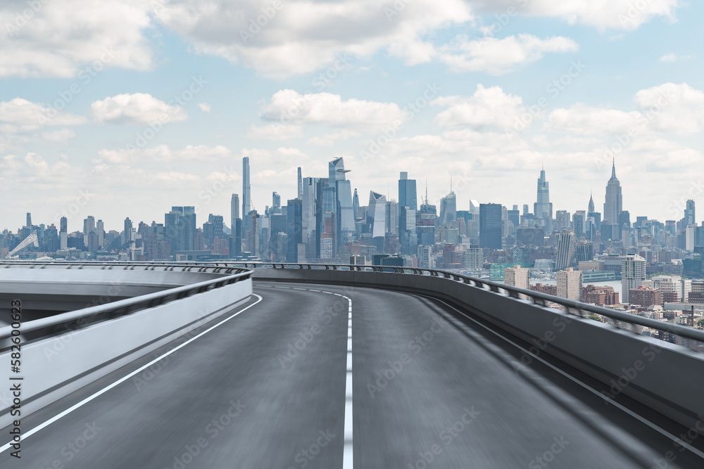 Empty urban asphalt road exterior with city buildings background. New modern highway concrete construction. Concept of way to success. Transportation logistic industry fast delivery. New York. USA.