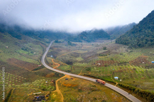 S-shaped road on National Highway 6 in Moc Chau district, Son La province, Vietnam seen from above