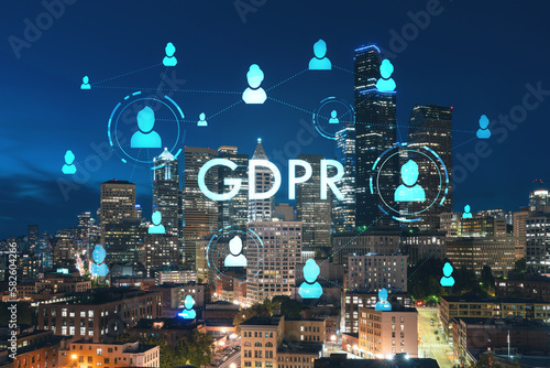 Illuminated aerial cityscape of Seattle  downtown at night time  Washington  USA. GDPR hologram  concept of data protection regulation and privacy for all individuals