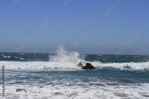 wave splashing on rock