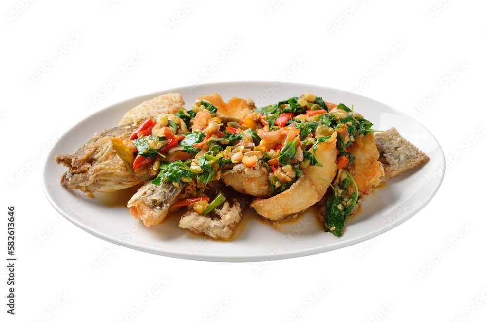 Fried fish with chilli and spices, delicious food Thailand style on transparent png Fried fish with chilli and spices, delicious food Thailand style on transparent png