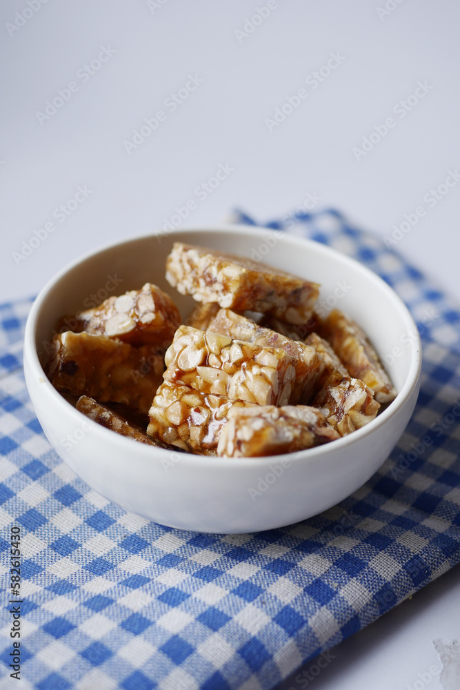 peanuts sweet candy in a bowl on table peanuts sweet candy in a bowl on table