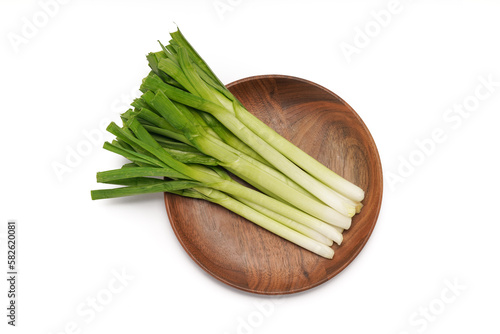 Green onions close-up on white background