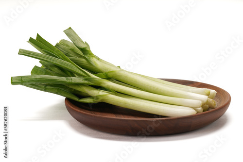 Green onions close-up on white background