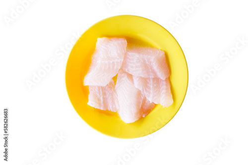 Fresh white Don Lee fillets cut into bite-sized pieces on a plate, top view shot