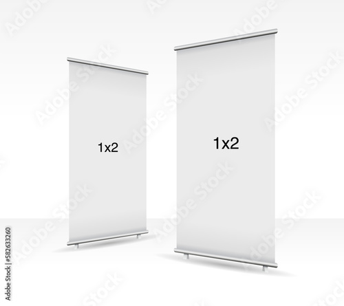 Set of 2 empty standee or rollup banner display mockup on isolated white background. Display mockup for presentation or exhibition product. Vertical blank roll up stand template in 1x2 sizes.