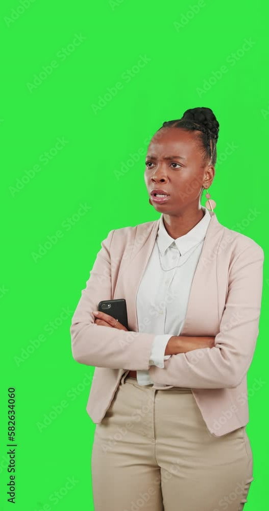 Phone, anger and a frustrated black woman on a green screen background in studio feeling upset. Mobile, bad news and upset with an angry young female frustrated by a text message on chromakey mockup Phone, anger and a frustrated black woman on a green screen background in studio feeling upset. Mobile, bad news and upset with an angry young female frustrated by a text message on chromakey mockup