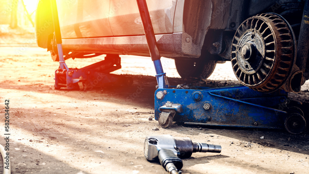 Seasonal tire change at a tire shop service Seasonal tire change at a tire shop service