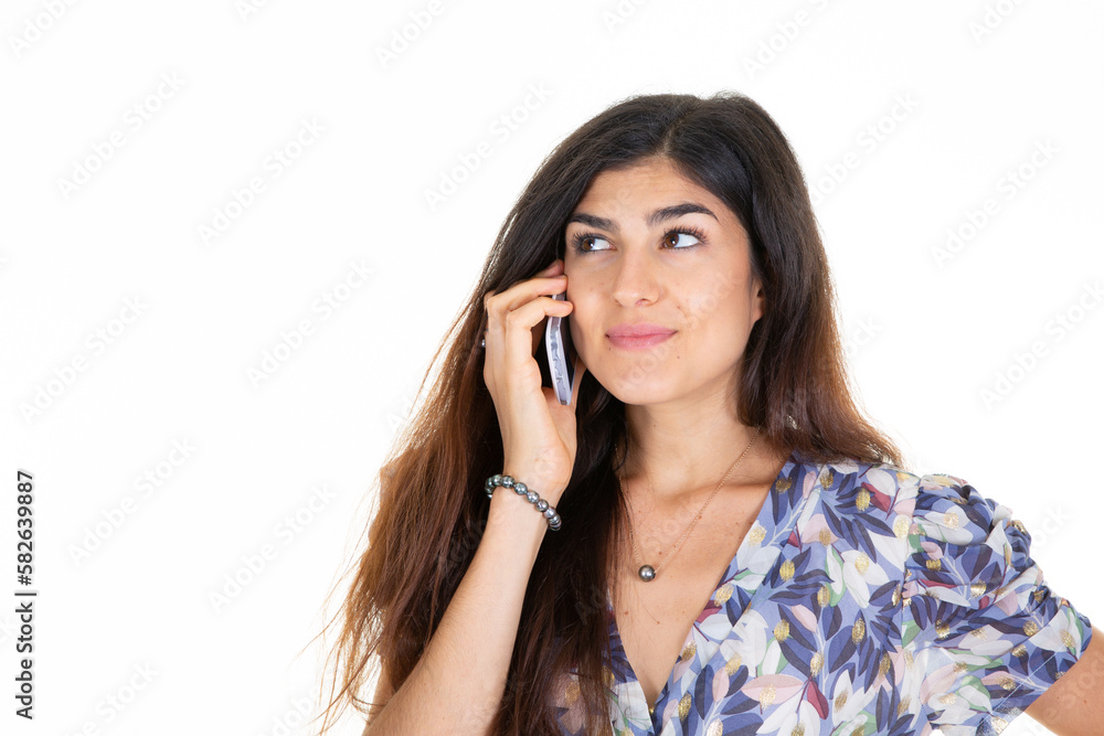brunette happy young girl talking phone in hand on white background brunette happy young girl talking phone in hand on white background