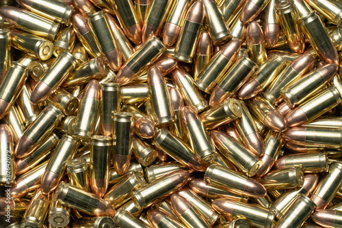 9mm caliber pistol cartridges, photo texture.