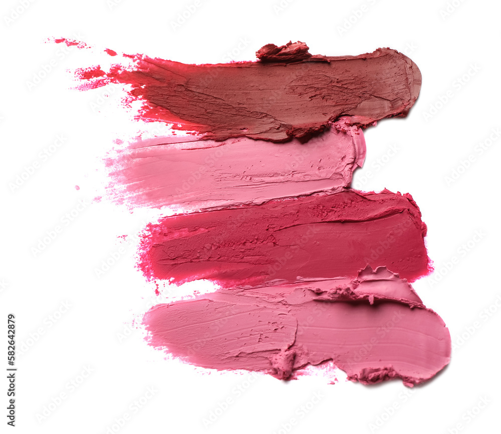 Smears of bright lipsticks on white background, top view