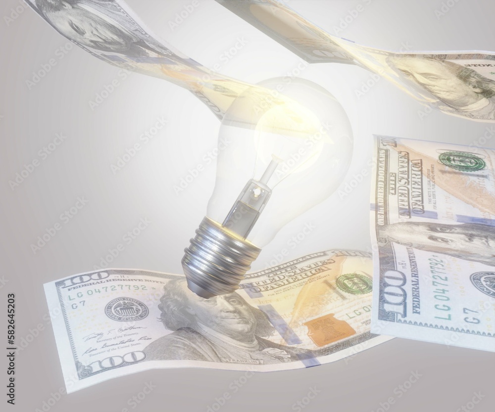 glowing light bulb and scattered money in the white background 3d rendering glowing light bulb and scattered money in the white background 3d rendering
