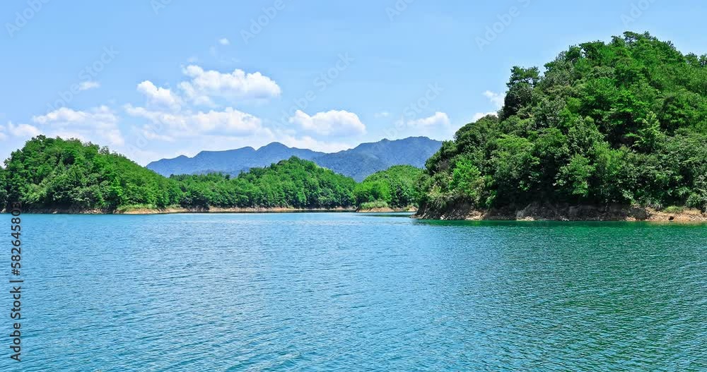 Beautiful Qiandao Lake natural landscape in Chun'an County, Hangzhou City, China. Qiandao Lake is also known as Xin'anjiang Reservoir. Fixed position shooting. Beautiful Qiandao Lake natural landscape in Chun'an County, Hangzhou City, China. Qiandao Lake is also known as Xin'anjiang Reservoir. Fixed position shooting.