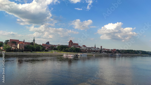 panoramic view of Old City of Torun. Vistula (Wisla) river against the backdrop of the historical buildings of the medieval city of Torun. Poland.