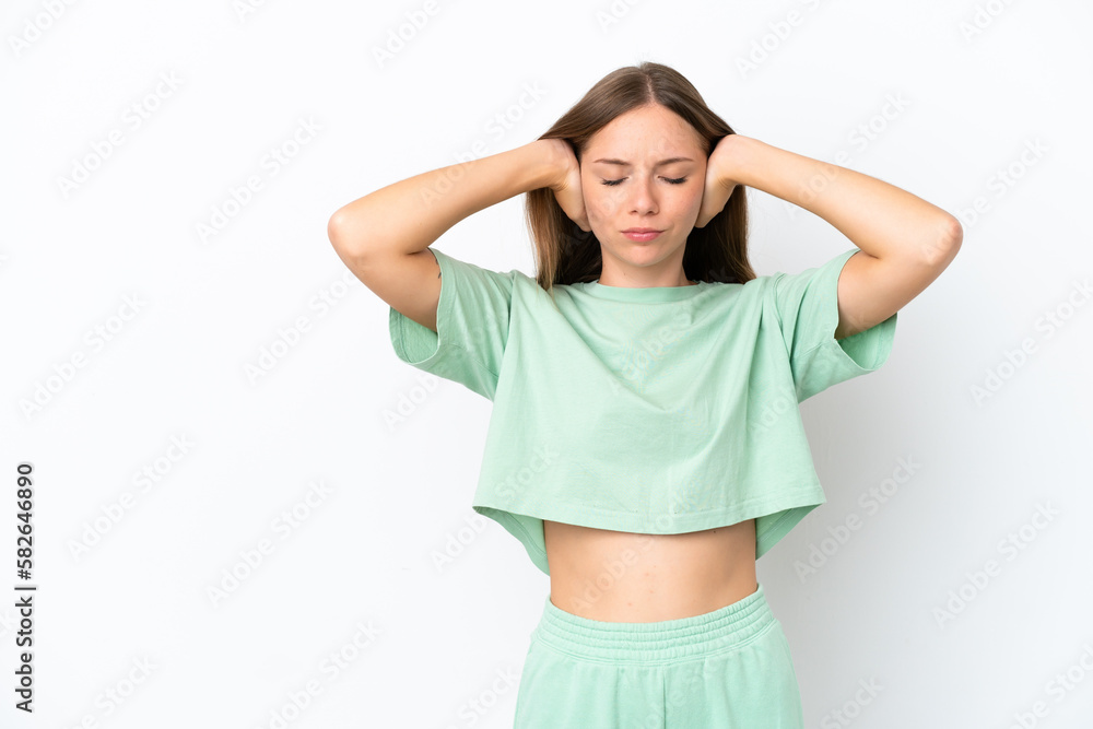 Young Lithuanian woman isolated on white background frustrated and covering ears Young Lithuanian woman isolated on white background frustrated and covering ears