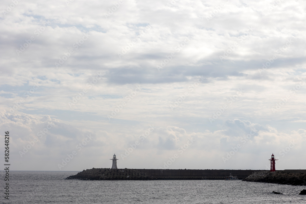 Two lighthouses and sea landscape
