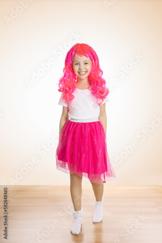 Wallpaper Mural Little girl smiling at camera wearing pink skirt and pink hair wig. Torontodigital.ca