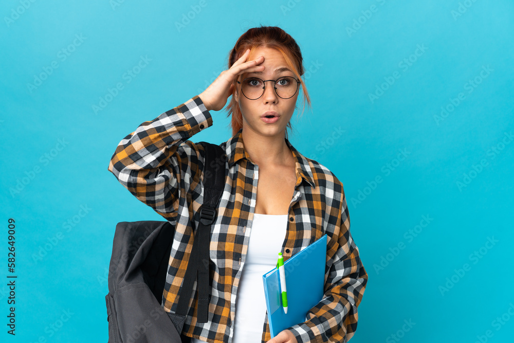Teenager student Russian girl isolated on blue background has realized something and intending the solution Teenager student Russian girl isolated on blue background has realized something and intending the solution
