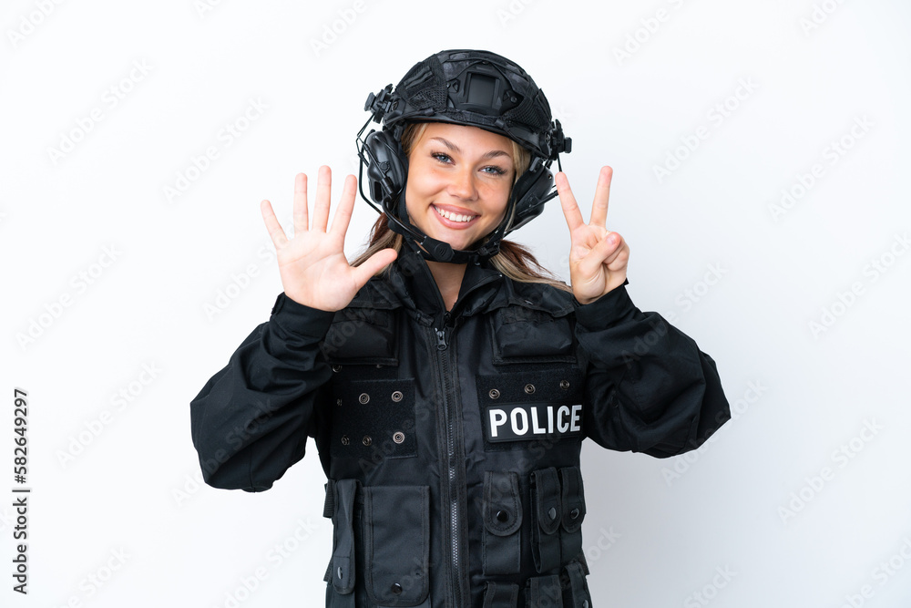 SWAT Russian woman isolated on white background counting seven with fingers SWAT Russian woman isolated on white background counting seven with fingers