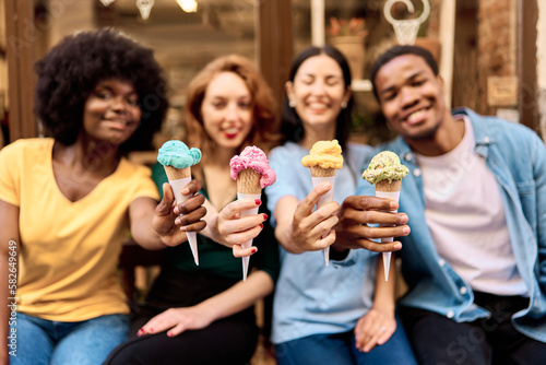 Photography Variety of ice creams on the hands of multiethnic people