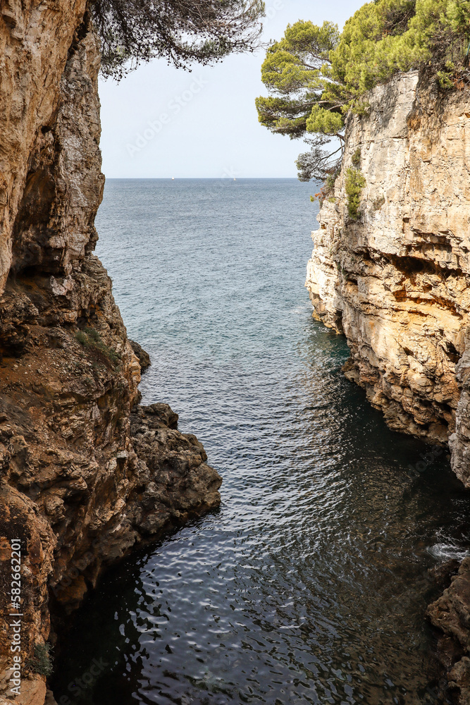 Vertical View of Verudela Canyon in Pula. Rock Formation During Summer Day in European Croatia.
