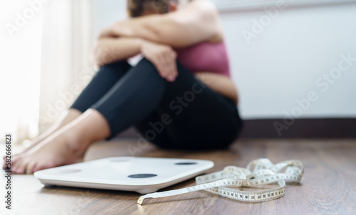 Photography Obese Woman with fat upset bored of dieting Weight loss fail  Fat diet and scale