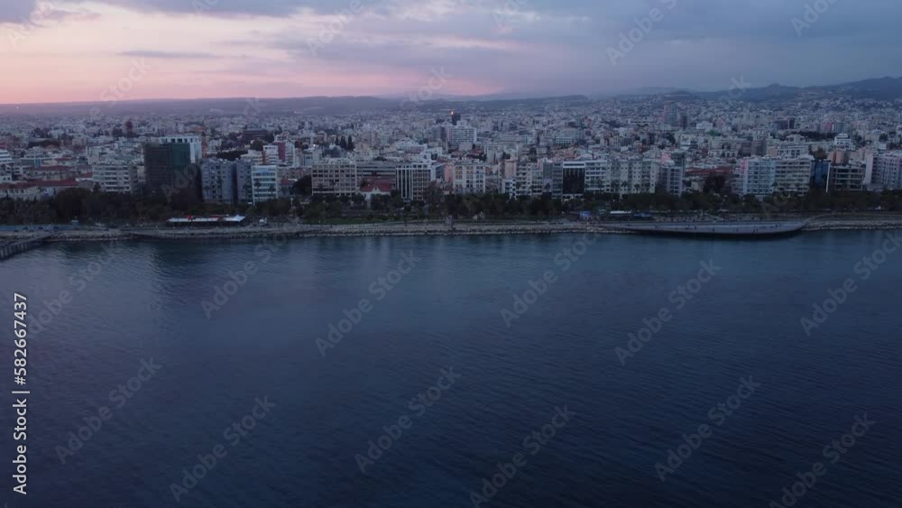 General view of the Limassol panorama from the Mediterranean Sea at sunset, taken from a drone General view of the Limassol panorama from the Mediterranean Sea at sunset, taken from a drone