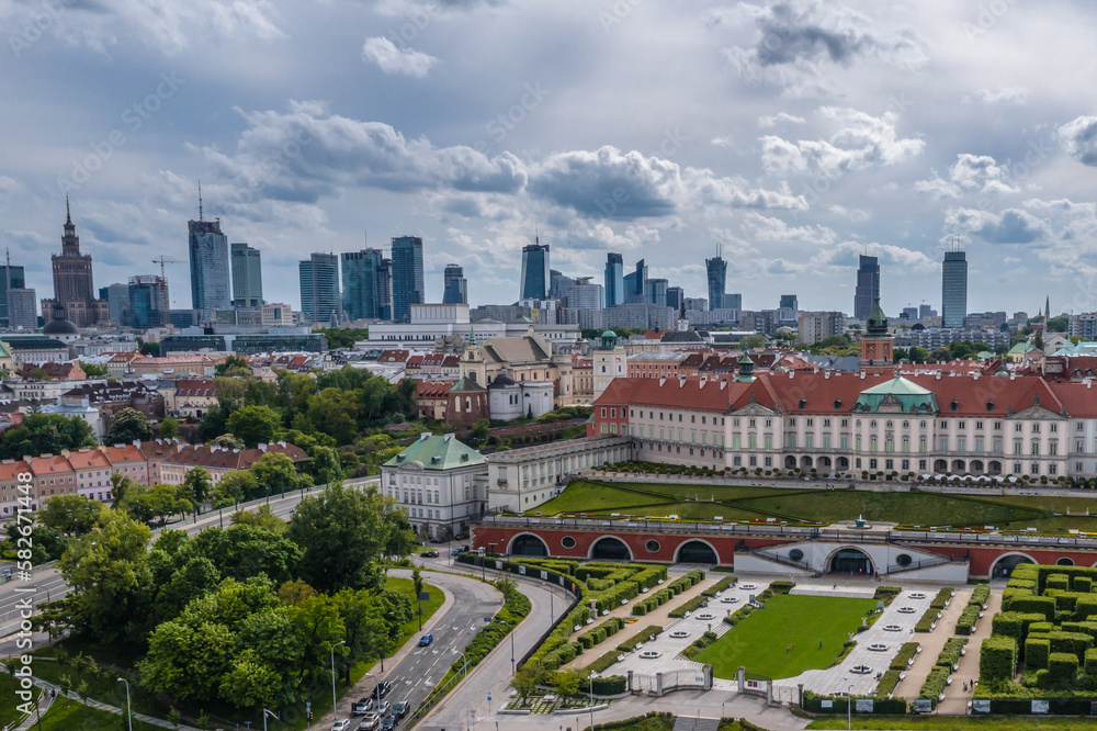 Royal Castle on the Old Town in Warsaw, city downtown on background, Poland Royal Castle on the Old Town in Warsaw, city downtown on background, Poland