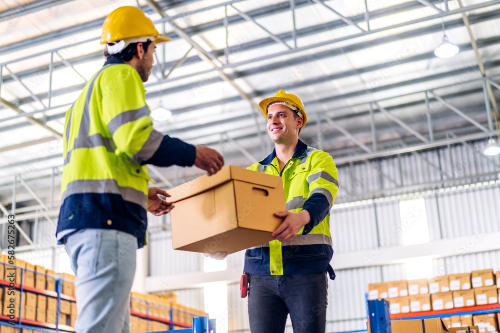 Engineer team cargo shipping transportation ship loading move inventory cardboard boxes in factory distributions warehouse at logistics center.logistic industry and business import export Engineer team cargo shipping transportation ship loading move inventory cardboard boxes in factory distributions warehouse at logistics center.logistic industry and business import export