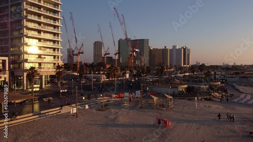 Construction on the coast of Tel Aviv, big city, panorama, sunset, israel