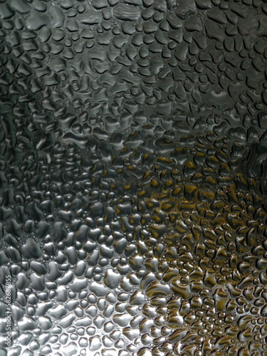 water drops under glass