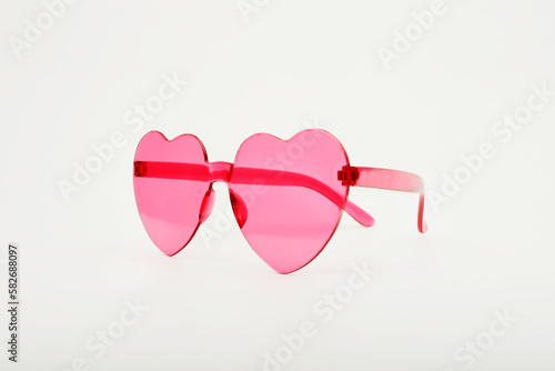 heart glasses sideways on light background