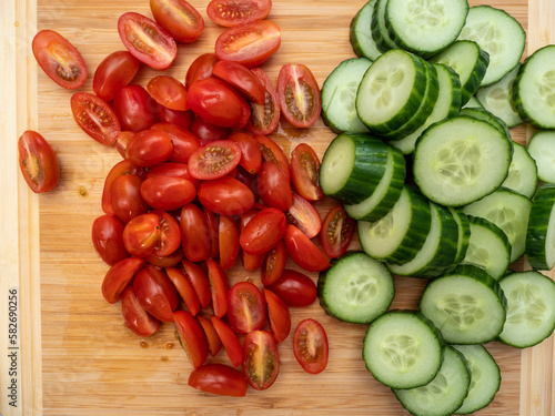 Chopped cucumbers and tomatoes. Salad with cucumbers and tomatoes. close-up.