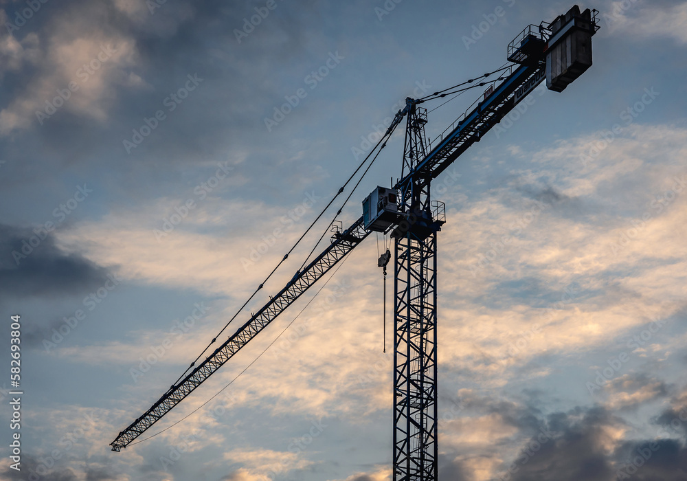 Crane on a building site in Warsaw city, Poland Crane on a building site in Warsaw city, Poland