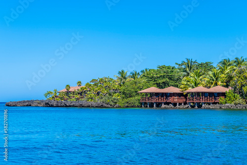 A view of beach properties close to West Bay on Roatan Island on a sunny day