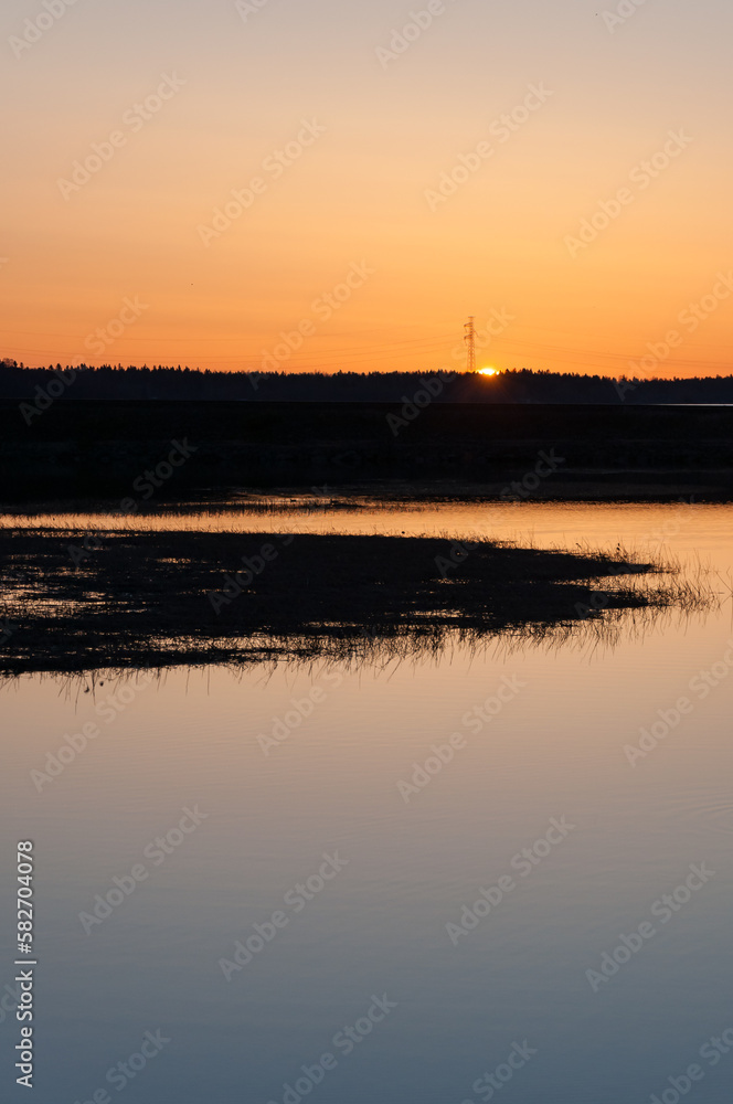 Sunrise over marshlands and river delta
