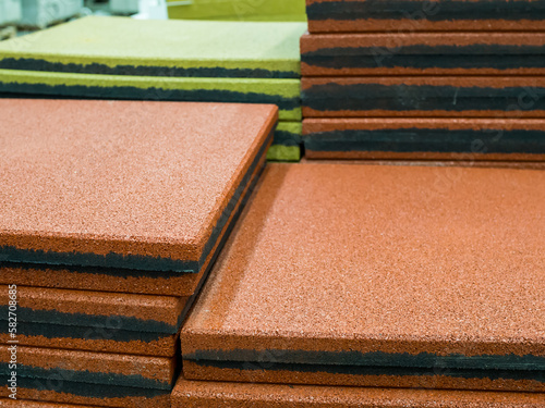Rubber tiles made from pressed crumbs