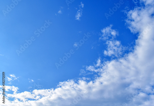 Blue sky and white clouds in a sunny day.  Beautiful sky in the morning. Concept of new life beginning  freedom of life and peaceful.