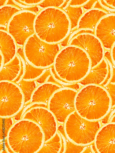 Great fresh and juicy oranges slices. Full frame in orange tones. Food background. 