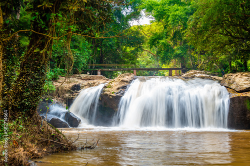 Mae sa waterfall near Chiang Mai city  Thailand. Flowing water in tropical rainforest.