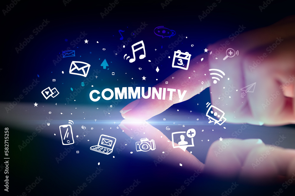 Finger touching tablet with social media icons concept Finger touching tablet with social media icons concept